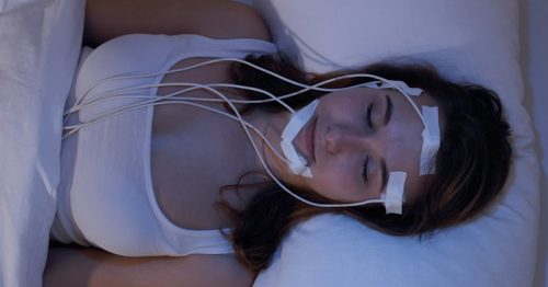 Woman taking a sleep test