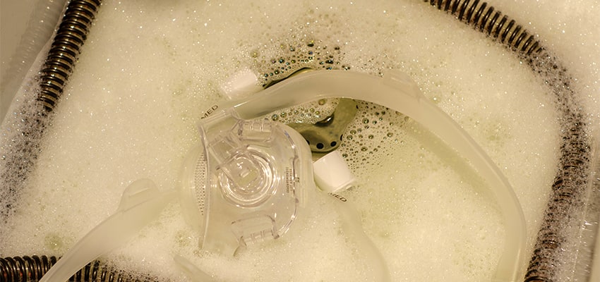 Cleaning CPAP equipment in soapy water