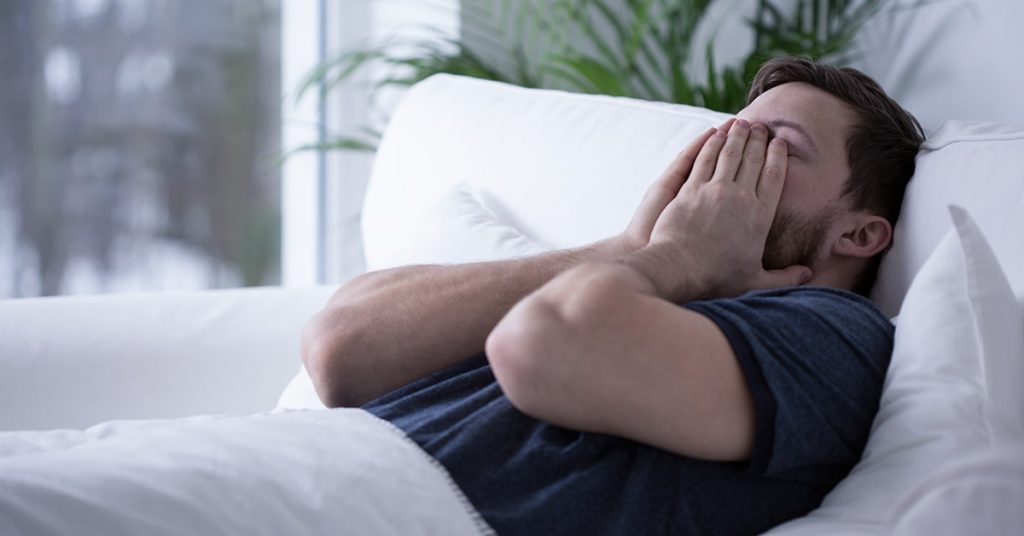 Man with sleep apnea symptoms